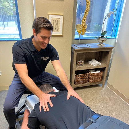Chiropractor Walnut Creek CA Brandon Holmes Adjusting Patient